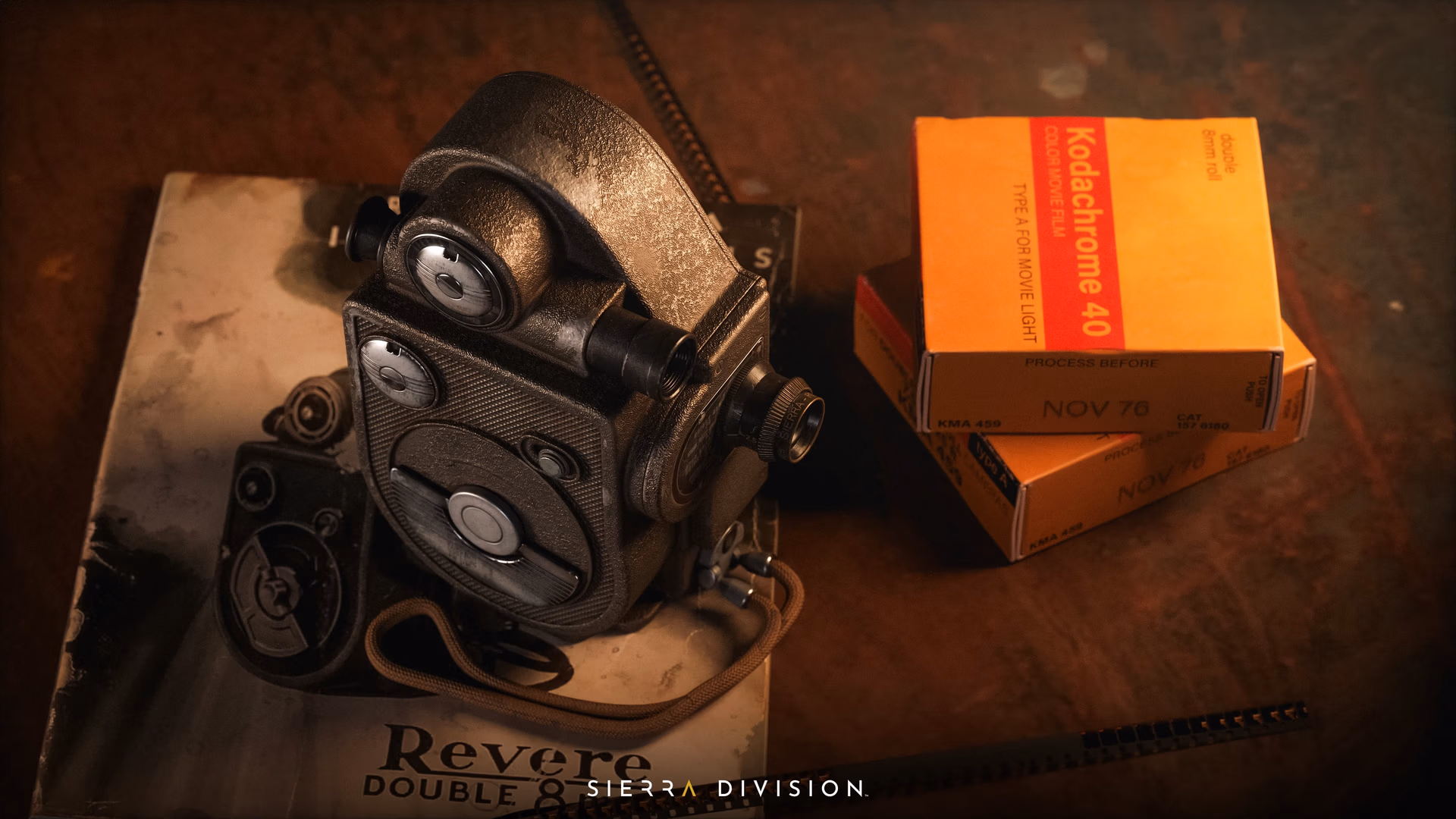 Vintage twin-lens 8mm movie camera on a worn metal book beside stacked orange Kodachrome 40 film boxes, warm cinematic